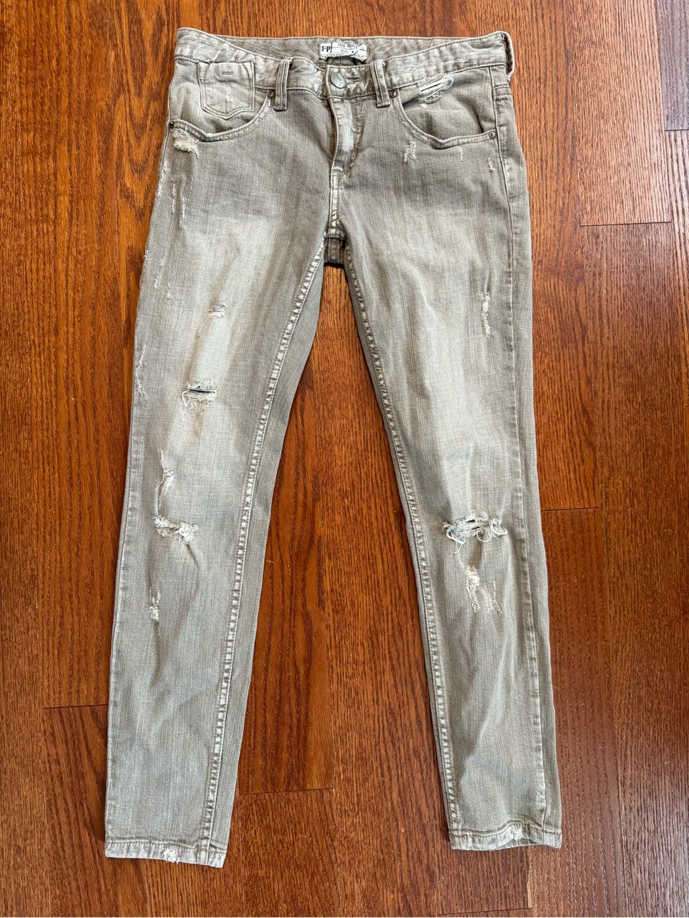 Free People Skinny Jeans in Faded Olive-Grey with Distressing